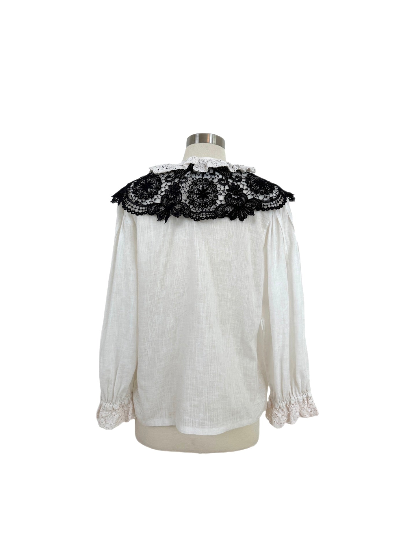 Linen shirt adorned by Jen Wonders